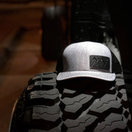 Grey / black coated aluminum badge cap